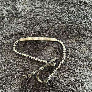 Elegant rose Gold and hematite beaded bracelet with adjustable cord closure